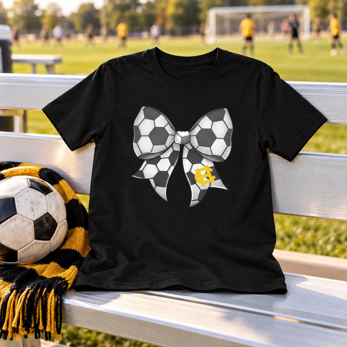 Harris County Soccer Bow Shirt on a black shirt in a styled game day setting