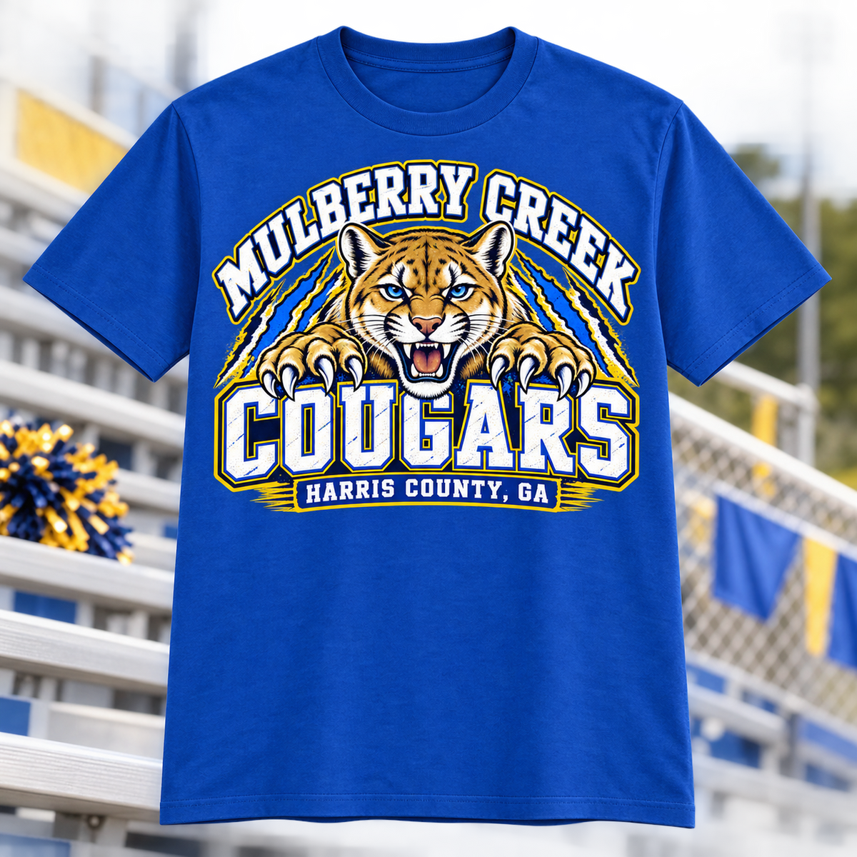 Mulberry Creek Cougars Spirit Adult Shirt on royal blue shirt